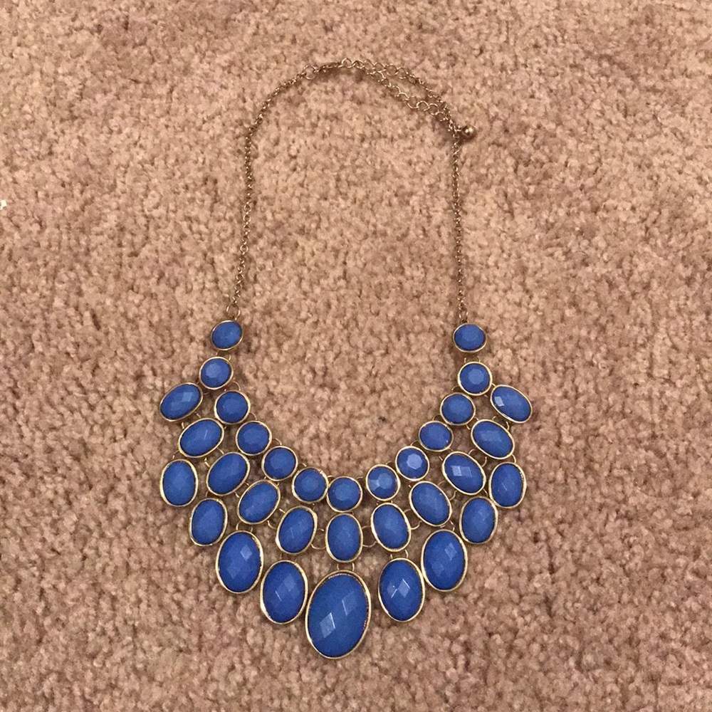 Gold chain necklace with pale blue gems